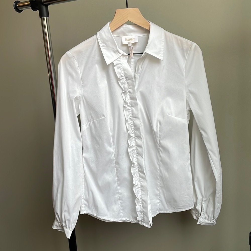 Crisp white ruffled button up